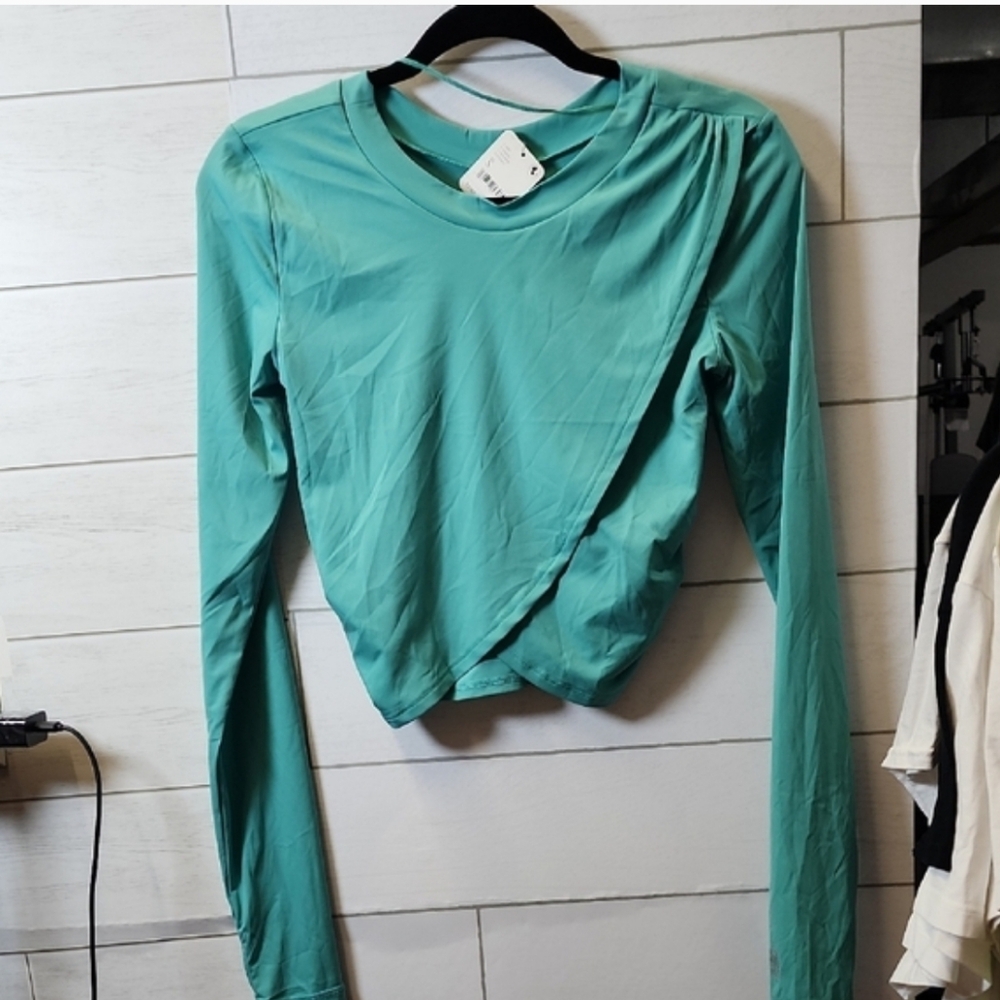FP Movement by Free People Teal Long Sleeve Twist Hem Top